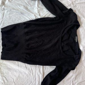 Black scoop neck sweater with fitted waist